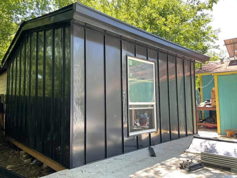 Black standing seam metal wall panels for Metal Roof Installation in New Bedford
