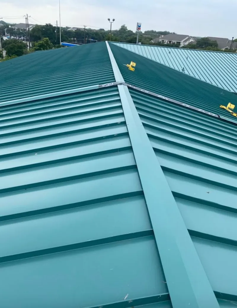 Green commercial metal roof ridge and valley for Metal Roof Repair in New Bedford